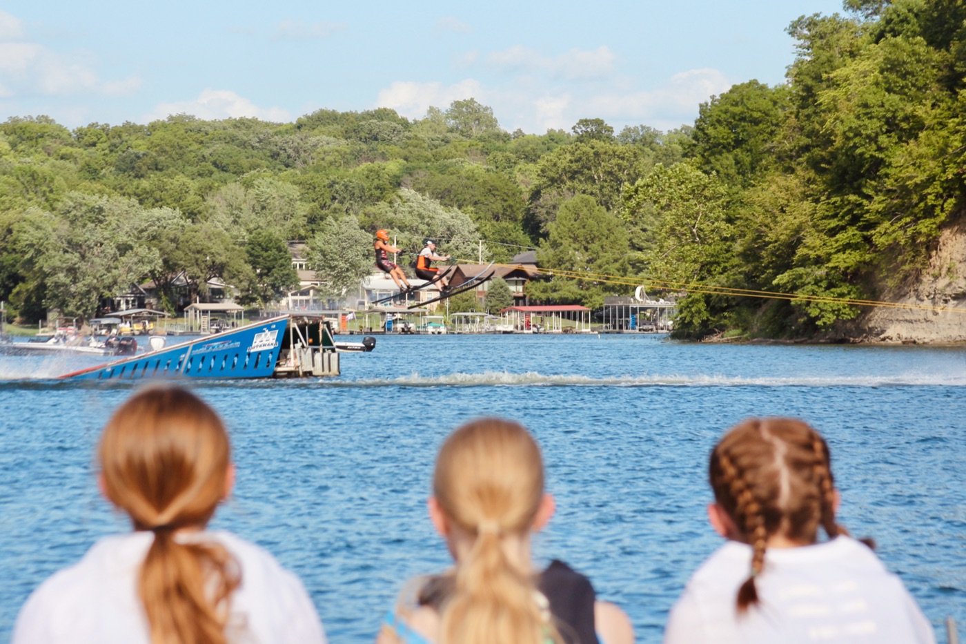 Water ski jumper at Lake Lotawana with crowd watching